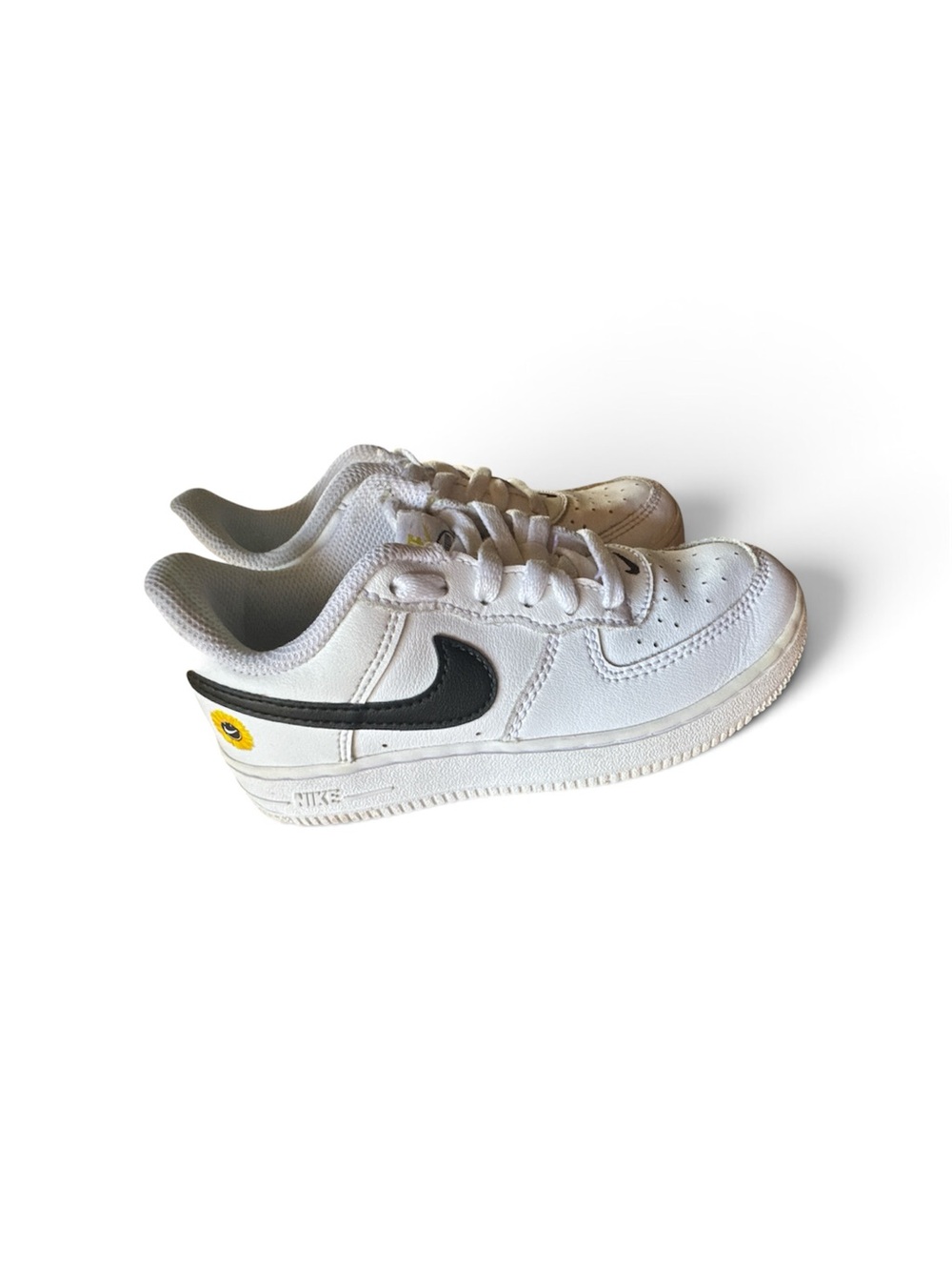 Nike Kids White Leather Sneakers with Black Swoosh and Yellow Accent